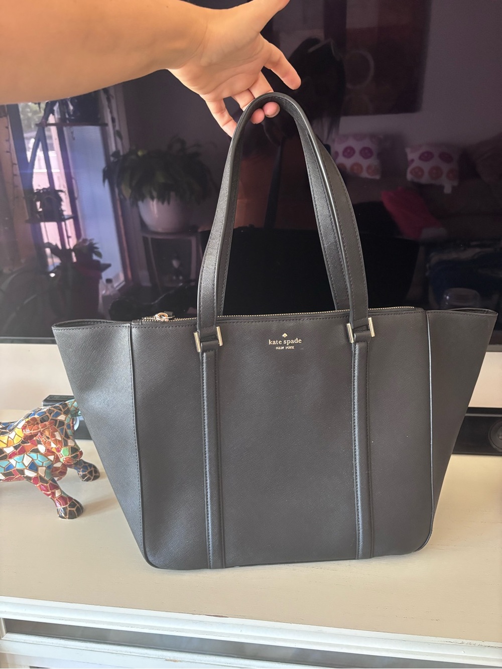 kate spade black leather tote with gold-tone logo